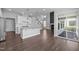 Stylish open concept kitchen with stainless steel appliances and a large island at 450 Shale Creek Dr, Durham, NC 27703