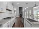 Bright kitchen with a large center island, modern appliances and an open concept at 450 Shale Creek Dr, Durham, NC 27703