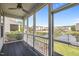 Relaxing screened patio overlooking a pond and a beautiful, peaceful suburban neighborhood at 450 Shale Creek Dr, Durham, NC 27703