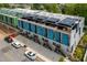 Modern townhome complex with solar panels, rooftop decks, and private entrances for each unit at 501 S Bloodworth St # 101, Raleigh, NC 27601