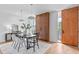 Bright dining room with modern light fixtures, wood accents, and stylish decor at 501 S Bloodworth St # 101, Raleigh, NC 27601