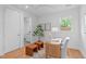 Bright office space featuring a modern desk, hardwood floors, and natural light at 501 S Bloodworth St # 101, Raleigh, NC 27601