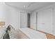 Bright and airy bedroom featuring a plush bed, stylish linens, and ample closet space at 501 S Bloodworth St # 104, Raleigh, NC 27601