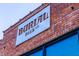 Exterior shot of a brick building with the Burial Beer Co. sign at 501 S Bloodworth St # 104, Raleigh, NC 27601