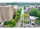 Elevated aerial view of tall buildings and lush green trees lining the street at 510 Glenwood Ave # 510, Raleigh, NC 27603