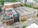 Overhead shot of building with parking garage, city street, and trees at 510 Glenwood Ave # 510, Raleigh, NC 27603
