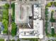 Bird's eye view of buildings with rooftop details, railroad tracks, and city streets at 510 Glenwood Ave # 510, Raleigh, NC 27603