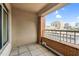 A spacious balcony with brick and metal railings provides city views at 510 Glenwood Ave # 510, Raleigh, NC 27603