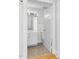 A well lit, classic-style bathroom with tile flooring and single vanity at 510 Glenwood Ave # 510, Raleigh, NC 27603