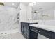 Lavish bathroom features a marble shower, floating vanity, and high-end finishes at 510 Glenwood Ave # 510, Raleigh, NC 27603
