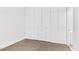 Bright bedroom with built-in storage and carpet flooring at 510 Glenwood Ave # 510, Raleigh, NC 27603