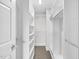 Walk-in closet with custom shelving and ample storage space at 510 Glenwood Ave # 510, Raleigh, NC 27603