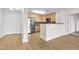 Kitchen with stainless steel appliances, wooden cabinets, breakfast bar, and hardwood floors at 510 Glenwood Ave # 510, Raleigh, NC 27603