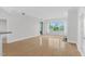 Open living area with wood floors, natural light, and city views at 510 Glenwood Ave # 510, Raleigh, NC 27603