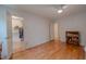 This spacious bedroom features hardwood floors, closet access, and ample natural light at 5632 Falkirk Dr, Durham, NC 27712