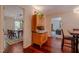 Dining room with antique wooden furniture, overhead lights and dark hardwood floors at 5632 Falkirk Dr, Durham, NC 27712