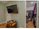 Main bedroom with a walk-in closet and a tv at 5632 Falkirk Dr, Durham, NC 27712