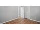 Comfortable bedroom with hardwood floors and closet space at 5805 Farm Gate Rd, Raleigh, NC 27606