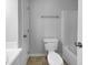 Neutral bathroom features toilet, shower and tub combo, and vanity at 6005 Antigua, Knightdale, NC 27545