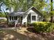 Charming single-story home with a well-manicured lawn, brick walkway, and inviting front entrance at 6005 Antigua, Knightdale, NC 27545