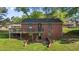 The house features a backyard with a wooden deck, perfect for outdoor entertaining and relaxing at 623 Oakgrove Dr, Graham, NC 27253