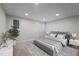This staged bedroom offers recessed lighting, a rug, and a window at 623 Oakgrove Dr, Graham, NC 27253