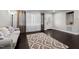 Open living room with dark hardwood flooring, light walls and an area rug at 623 Oakgrove Dr, Graham, NC 27253