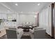 Bright and airy living room featuring modern decor and dark hardwood floors at 623 Oakgrove Dr, Graham, NC 27253