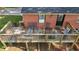 Spacious wooden deck with outdoor seating, accessed from the home's upper level at 623 Oakgrove Dr, Graham, NC 27253