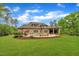 This home has a stunning backyard with a pool, outdoor kitchen, and lush landscaping, perfect for outdoor enjoyment at 628 Carolina Crossings Dr, Apex, NC 27523