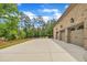 This beautiful brick home features a spacious driveway and three-car garage, perfect for the car enthusiast at 628 Carolina Crossings Dr, Apex, NC 27523