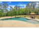 Relax and unwind in this backyard pool oasis, featuring a hot tub and ample seating perfect for outdoor gatherings at 628 Carolina Crossings Dr, Apex, NC 27523