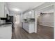 Open kitchen with stainless appliances, granite counters, and seamless access to an adjacent living space at 7030 Shep Royster Rd, Oxford, NC 27565