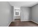 Spacious main bedroom leading to an ensuite bathroom with new flooring at 7030 Shep Royster Rd, Oxford, NC 27565