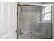 Bathroom featuring a glass-enclosed shower with tile surround, creating a clean and modern aesthetic at 7030 Shep Royster Rd, Oxford, NC 27565
