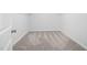 A walk-in closet with carpet and wire shelving providing great storage space at 721 Denburn Pl, Raleigh, NC 27603