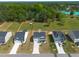 New construction home boasts a manicured lawn, spacious driveway, and two-car garage at 80 Spotted Bee Way, Youngsville, NC 27596
