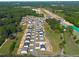 Overhead view of a planned community surrounded by lush greenery, showcasing the layout and serene environment at 80 Spotted Bee Way, Youngsville, NC 27596
