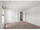 This bedroom features neutral walls and carpet, with windows to maximize light at 80 Spotted Bee Way, Youngsville, NC 27596