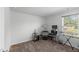 Bonus room featuring carpet floors, a large window, and musical equipment setup at 80 Spotted Bee Way, Youngsville, NC 27596