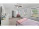 Comfortable main bedroom with a ceiling fan and a view of the surrounding neighborhood at 80 Spotted Bee Way, Youngsville, NC 27596