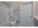 Clean bathroom featuring a shower/tub combo, white toilet, and neutral wall color at 800 Gathering Park Cir # 204, Cary, NC 27519