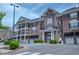 Elegant brick building with private garages and balconies offers sophisticated living at 800 Gathering Park Cir # 204, Cary, NC 27519