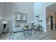 Cozy living room with high ceilings, comfortable seating, and decorative artwork at 800 Gathering Park Cir # 204, Cary, NC 27519