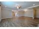Expansive living room with hardwood floors, open layout, and modern lighting at 800 Gathering Park Cir # 204, Cary, NC 27519