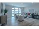 Bright living room featuring an arched window, cozy seating and neutral color palette at 800 Gathering Park Cir # 204, Cary, NC 27519
