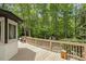Large back deck with ample space for outdoor seating and enjoying the serene wooded surroundings at 814 Ellynn Dr, Cary, NC 27511