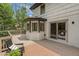 Charming back deck featuring a bay window, sliding doors, and outdoor seating with a cozy rug at 814 Ellynn Dr, Cary, NC 27511