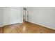 Large bedroom with hardwood floors and a closet for ample storage at 814 Ellynn Dr, Cary, NC 27511