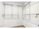 Walk-in closet with ample storage space provided by the wire shelving system, offering practical organization for clothing and accessories at 814 Ellynn Dr, Cary, NC 27511